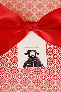 red gift wrapping bow ribbon family photos